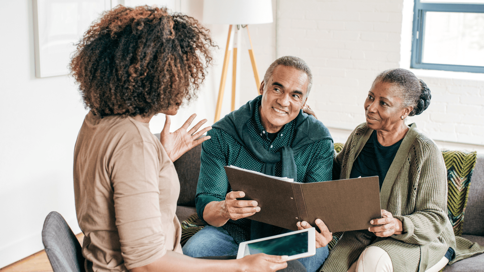 Dementia care professional having a discussion with a family