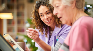 Dementia care worker with patient