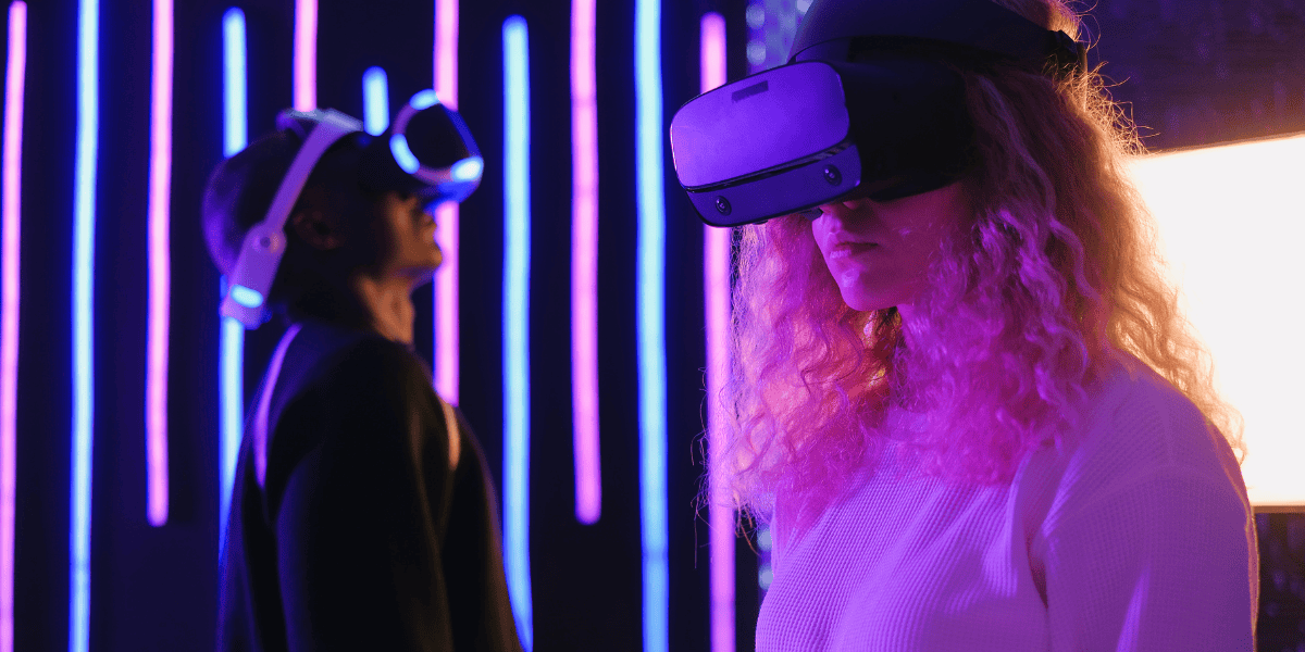 Two people using VR headsets