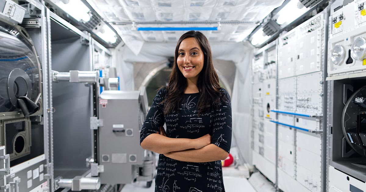 Woman standing inside spaceship
