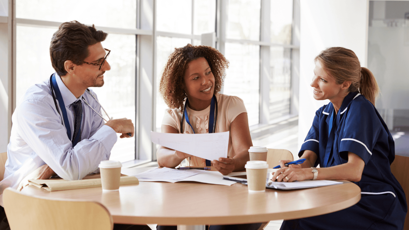 Three healthcare leaders having a meeting