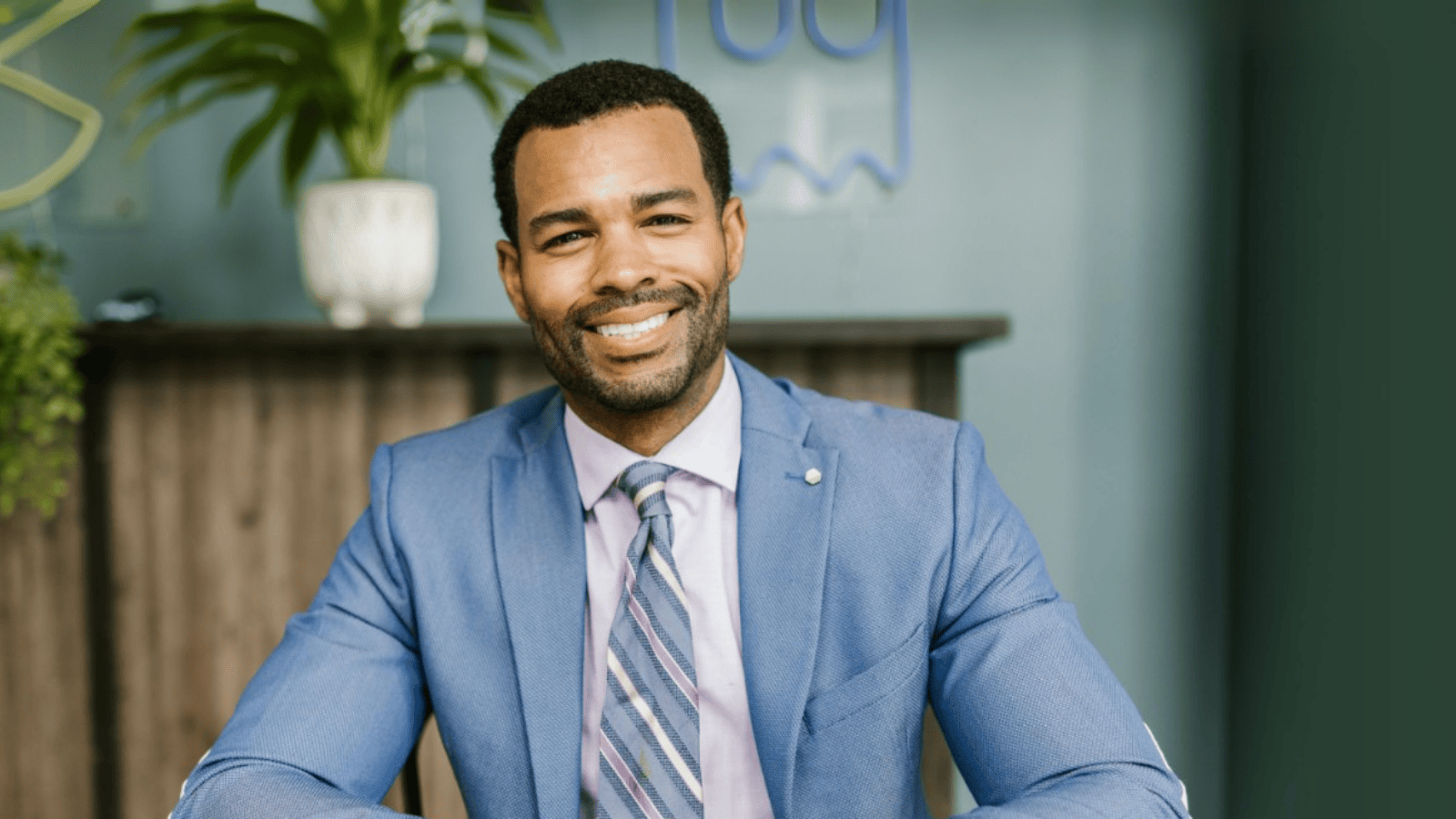 Professional man in a suit smiling