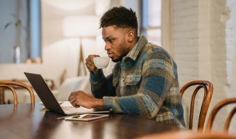 Hull Online student working on a laptop