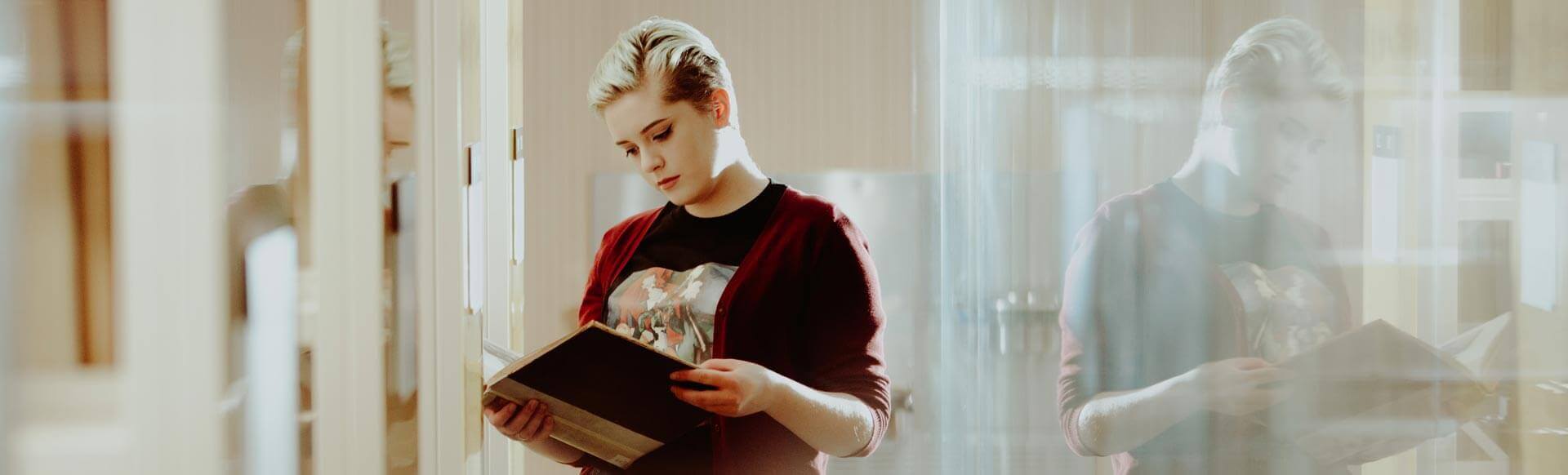 Hull Online student reading a book