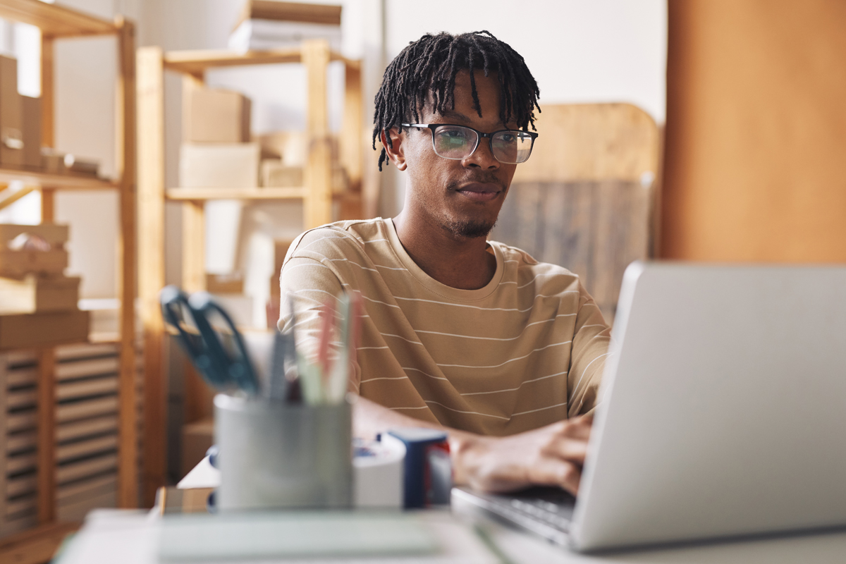 Man attending a Hull Online event on a laptop