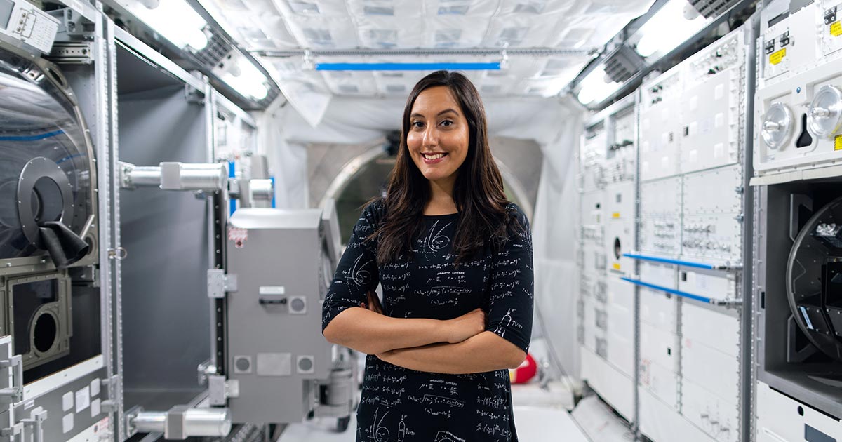 Woman standing in a spaceship